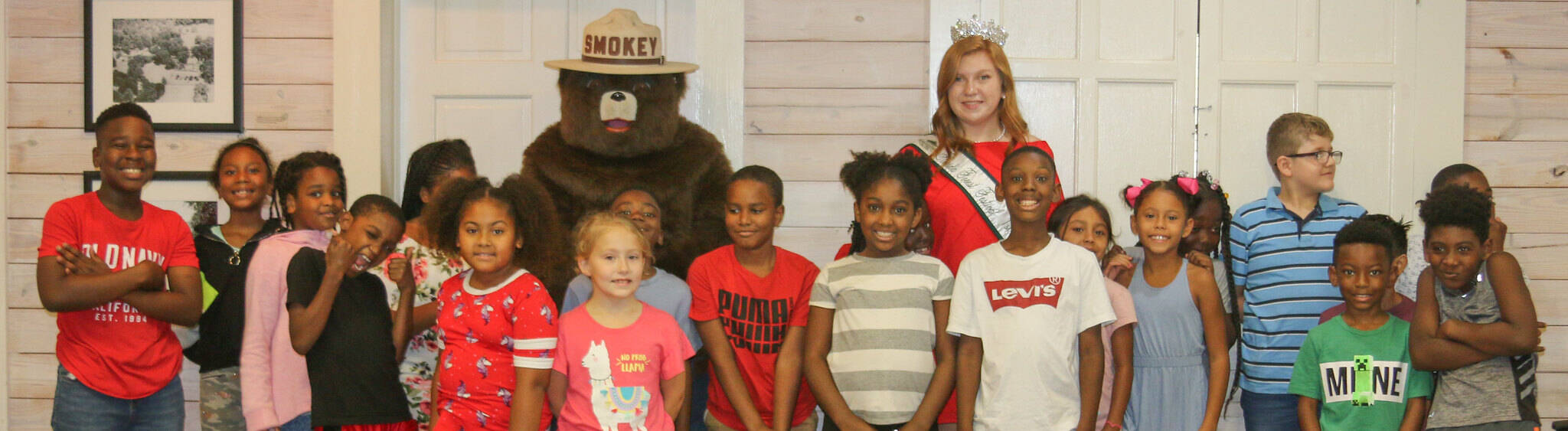 Children with smokey the bear